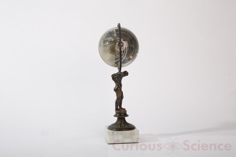 Glass Sphere on Marble Base